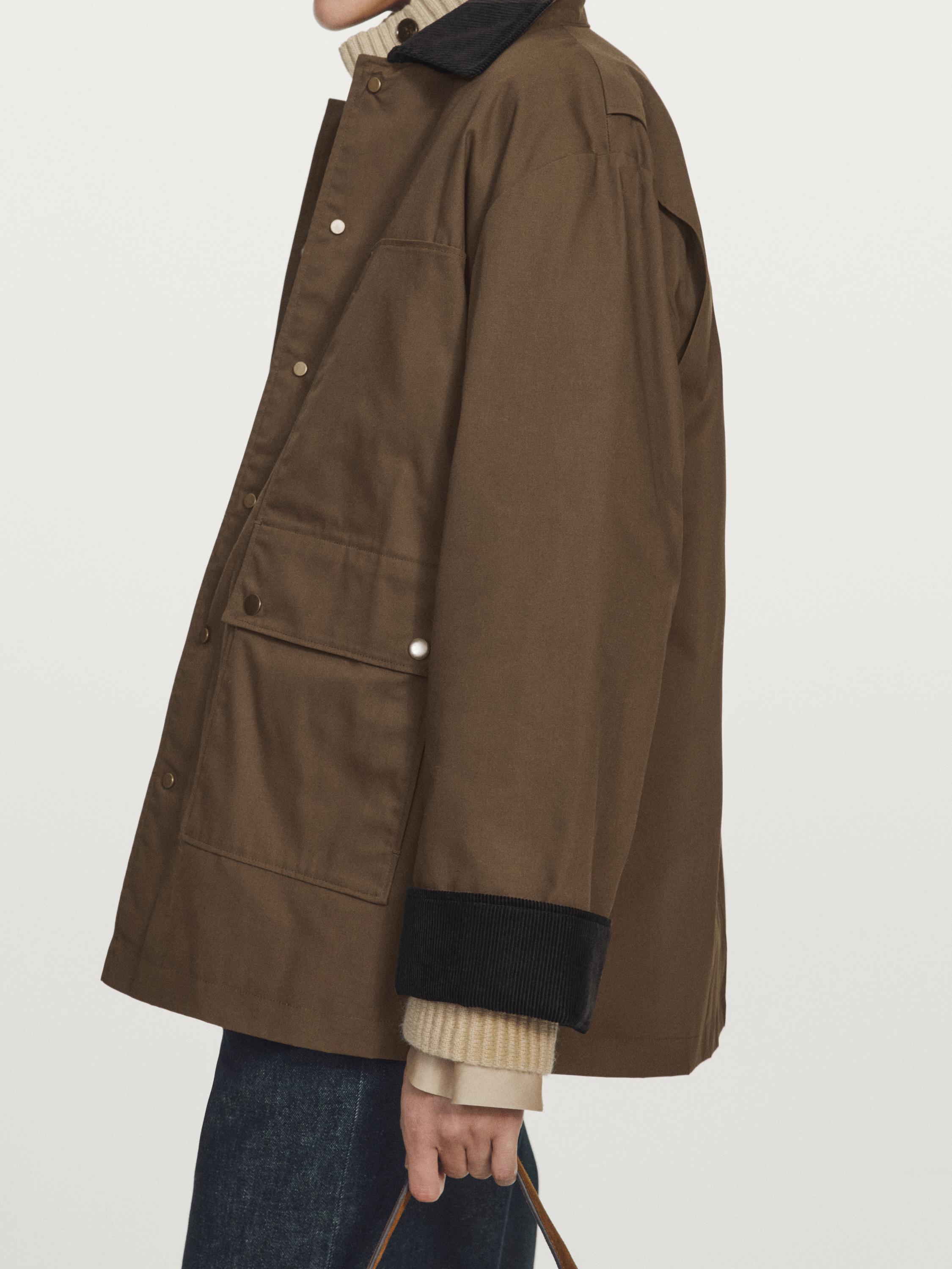 Waxed parka with corduroy detail
